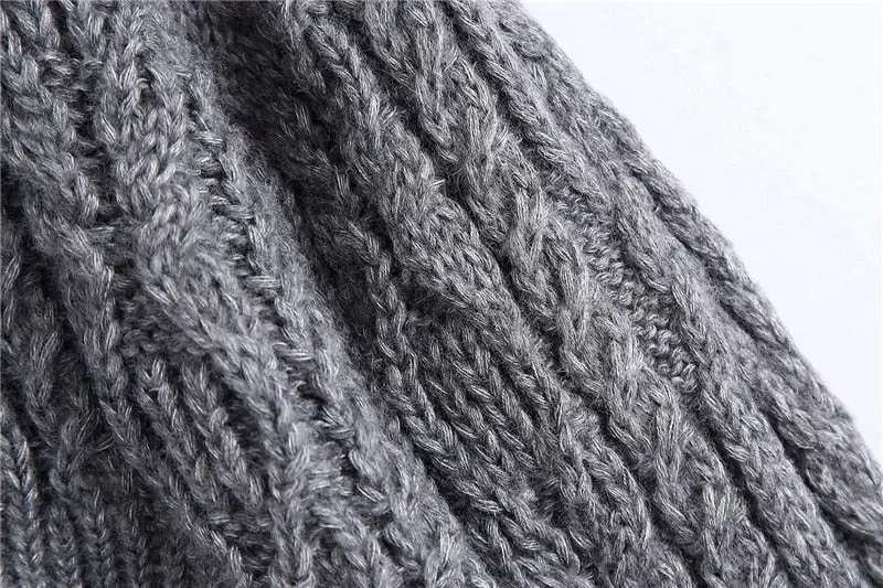 CROPPED CABLE-KNIT SWEATER