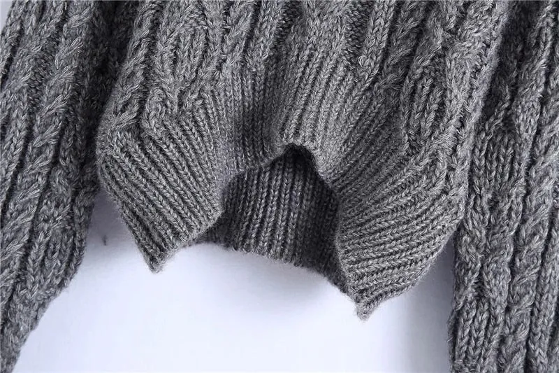CROPPED CABLE-KNIT SWEATER